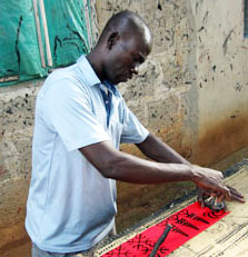 Adinkra Cloth being Stamped